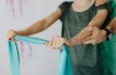 Person stretching their arms to support joint mobility